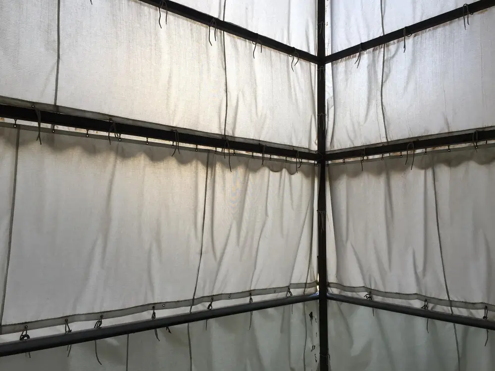Agricultural curtain fabric on a livestock building