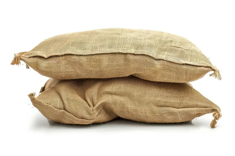 Stacks of coloured stitched sand bags