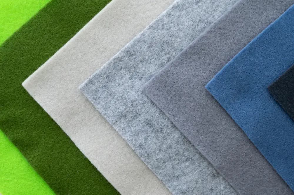 Non-woven carpet material in a warehouse
